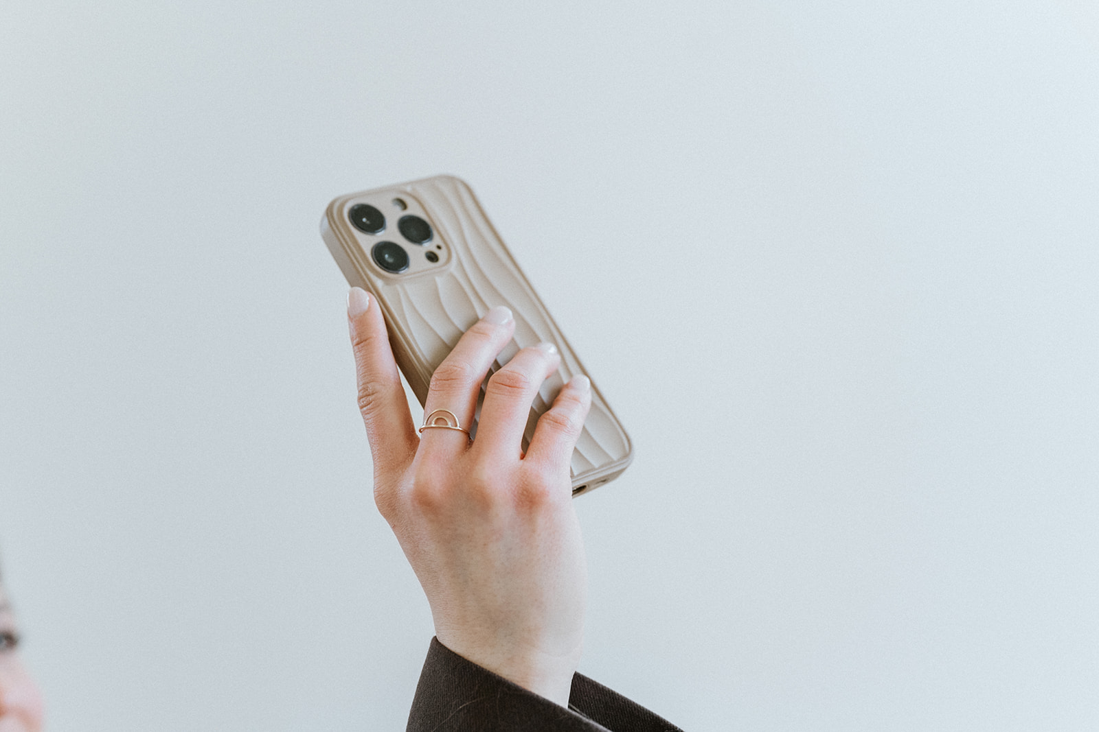 phone in the air for Zage marketing firm
